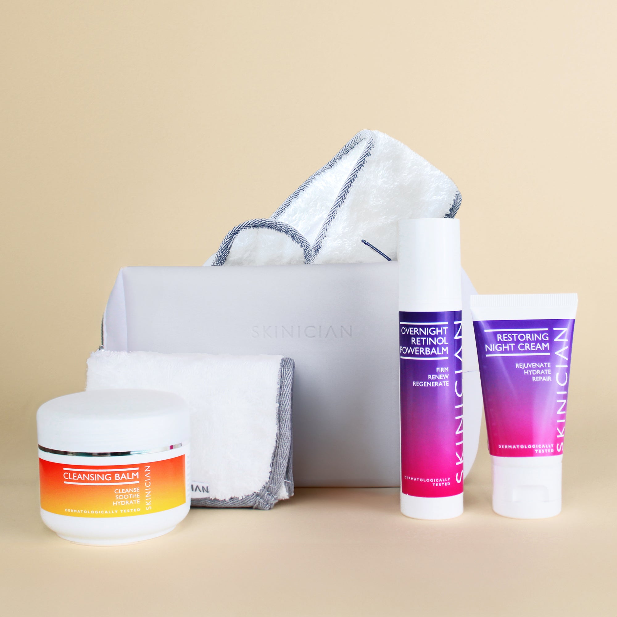 Image of Skinician Nighttime Rituals Skincare Set and the products inside on a beige background.