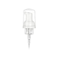 White pump bottle with clear lid on a white background