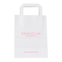 White tote bag with 'SKINICIAN' branding and website URL on a white background