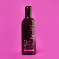 Bottle of he-shi Rapid Hour Liquid Tan on a pink background