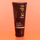 Image of He-Shi Dark Day to Day Gradual bottle on an orange background
