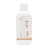 White spray tan bottle labeled 'he-shi Classic Gold' on a white background