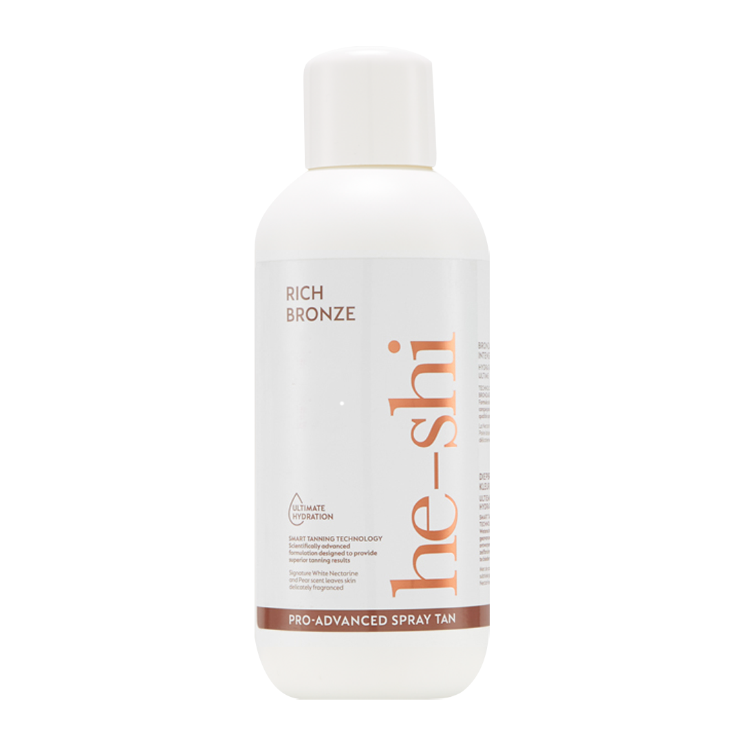He-Shi Rich Bronze spray tan bottle on a white background