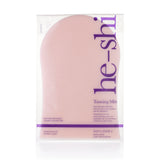 Pink tanning mitt with 'he-shi' branding on a white background