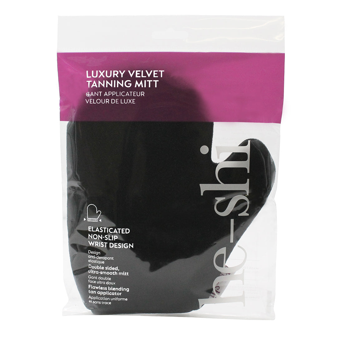 He-Shi Velvet Tanning Mitt in outer plastic sleeve on white background