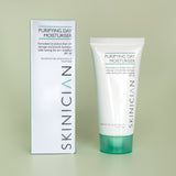 Skinician purifying day moisturizer tube and packaging on a light green background