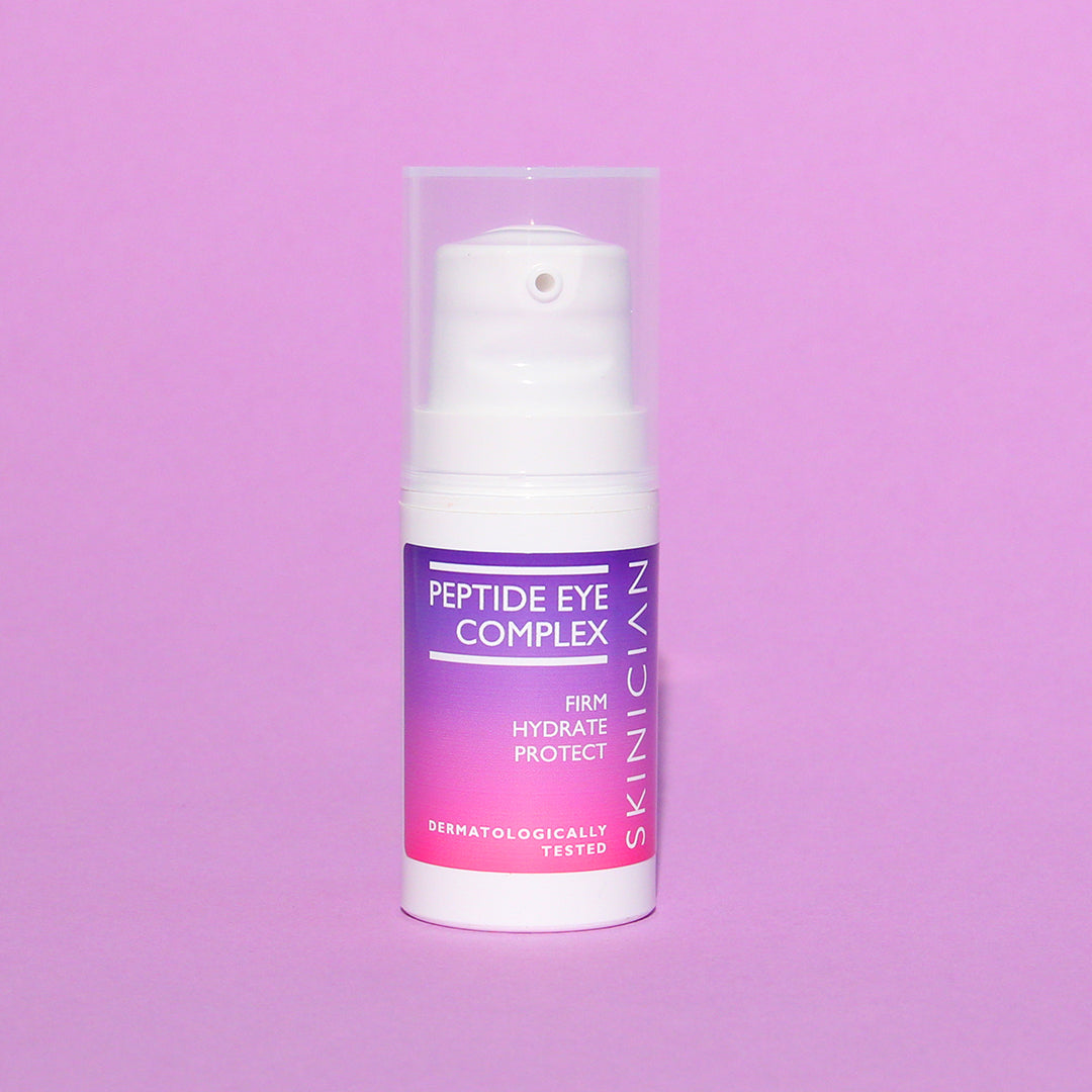 Skinician Peptide Eye Complex bottle on a purple background