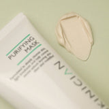 Purifying clay mask tube and mask texture displayed. 