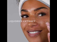 A youtube video of a lady opening the box and applying the purifying mask to her face.