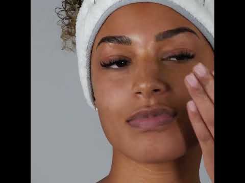 Youtube video of a lady unboxing the purifying face wash and applying to her face for cleansing.