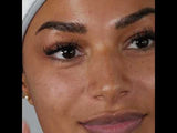 YouTube video of SKINICIAN Calming serum for face. Shows lady removing tube from the carton, dispensing onto fingertips and applying to face.  A quartz roller is used to massage face and neck.