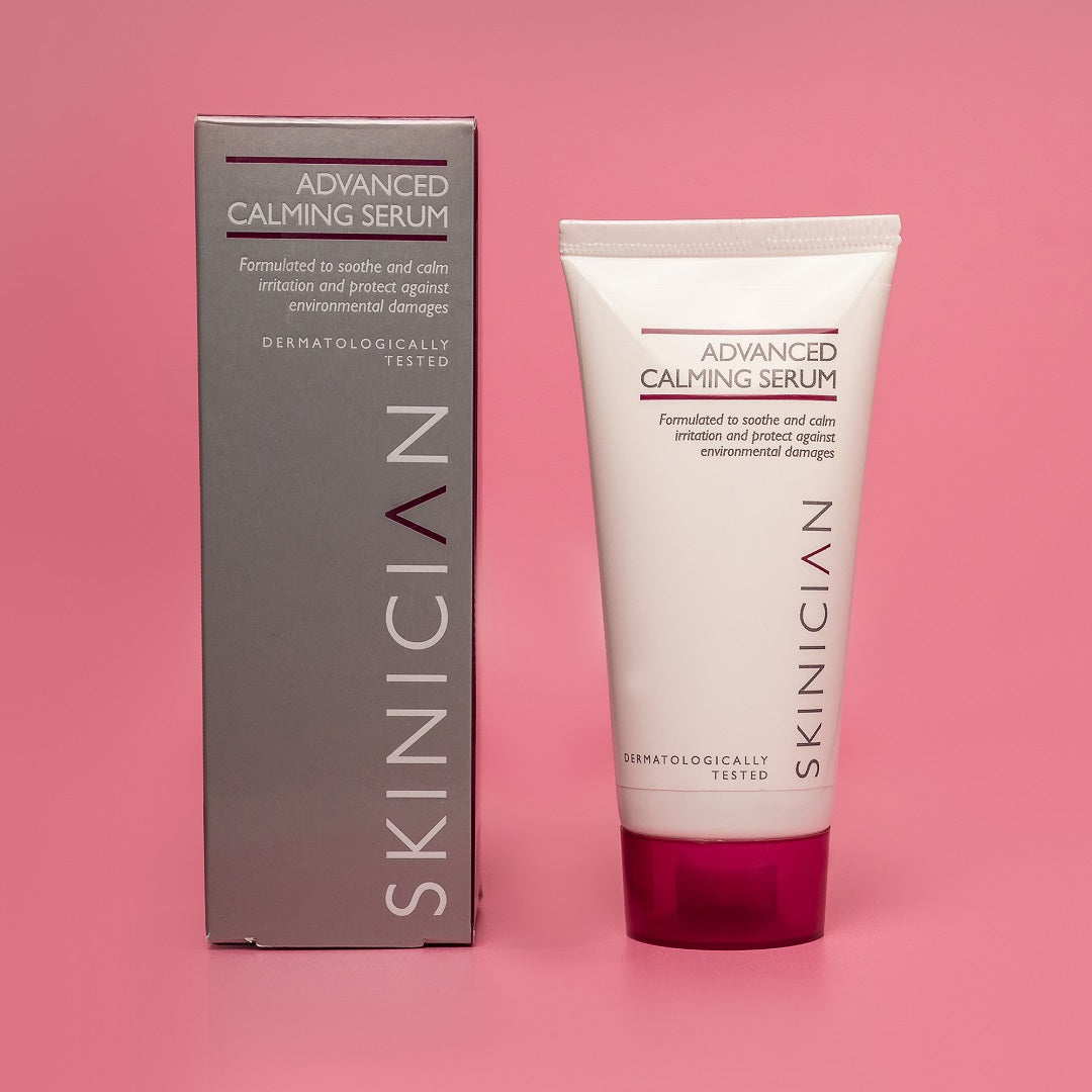 Skinician Advanced Calming Serum packaging on a pink background