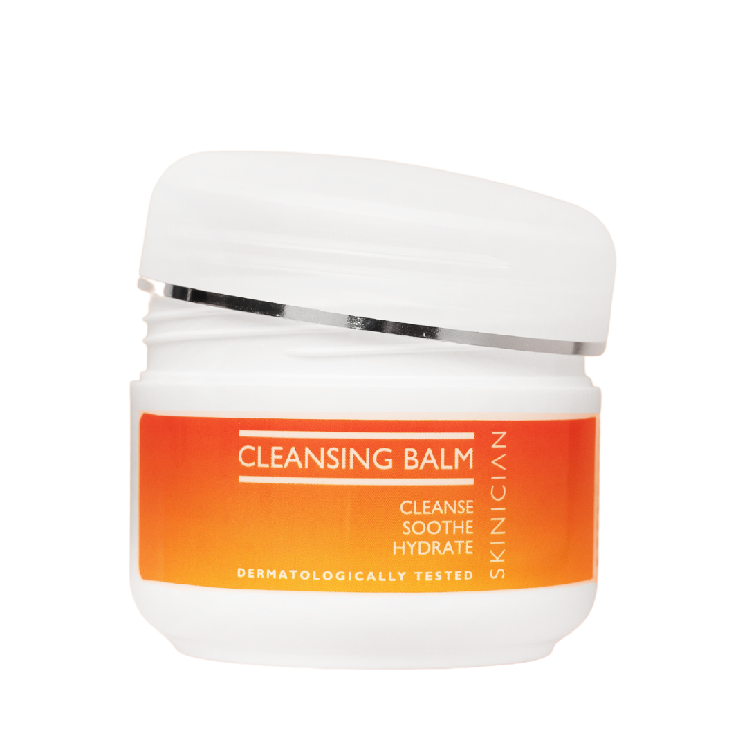 Cleansing balm jar with orange label on a white background
