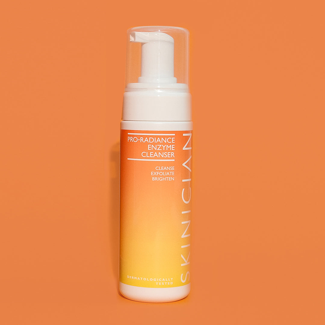 Image of Skinician Pro-Radiance Enzyme Cleanser bottle on orange background