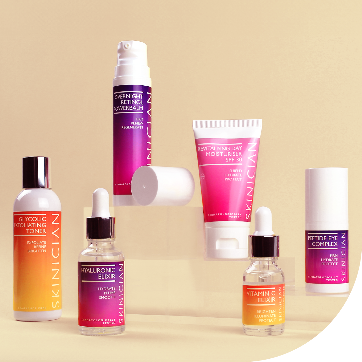 Collection of Skinician skincare products on a beige background