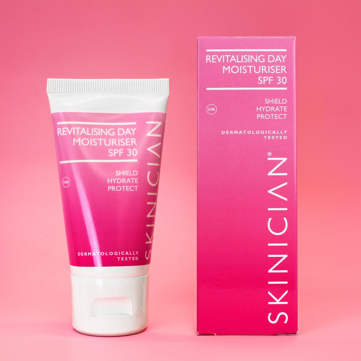 SKINICIAN revitalising day moisturiser SPF 30 on a pink background