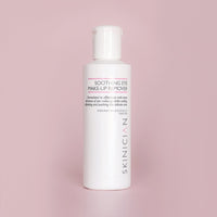 Soothing Eye Make-Up Remover on a pink background