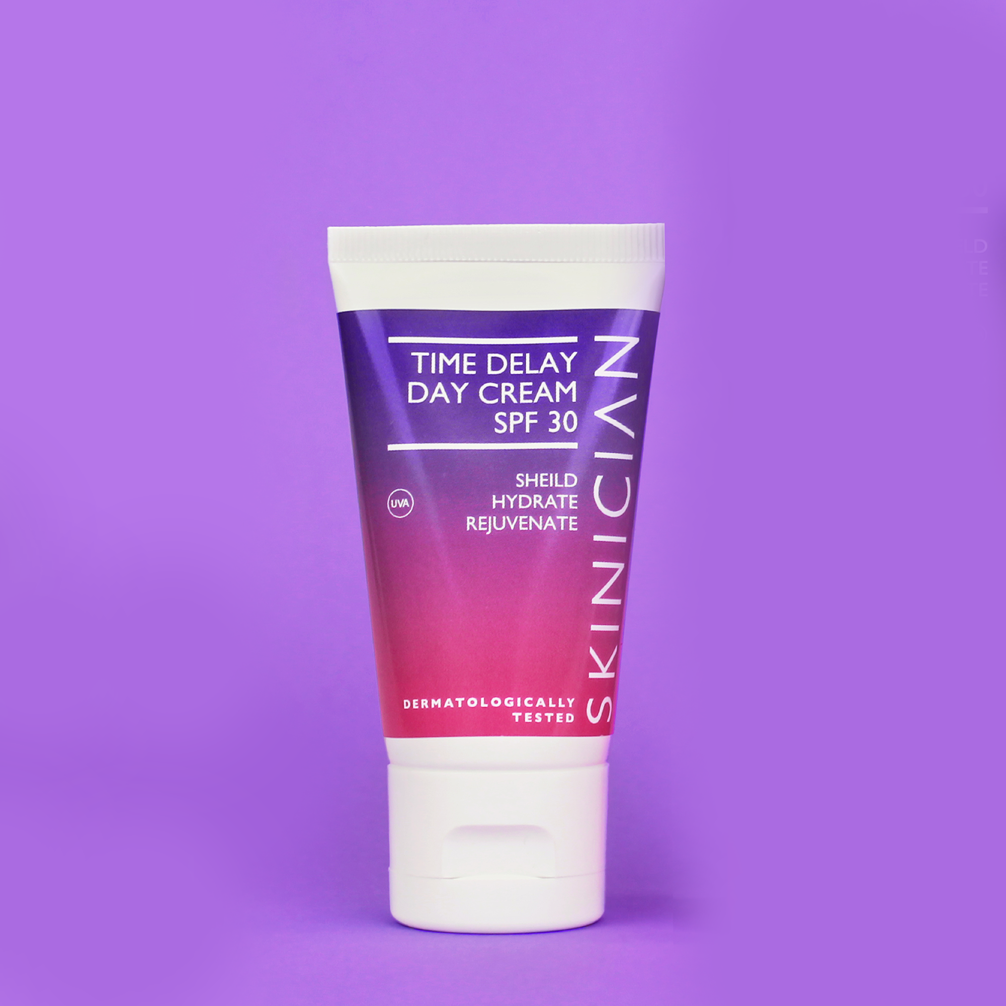 Tube of Skinician Time Delay Day Cream SPF 30 on a purple background